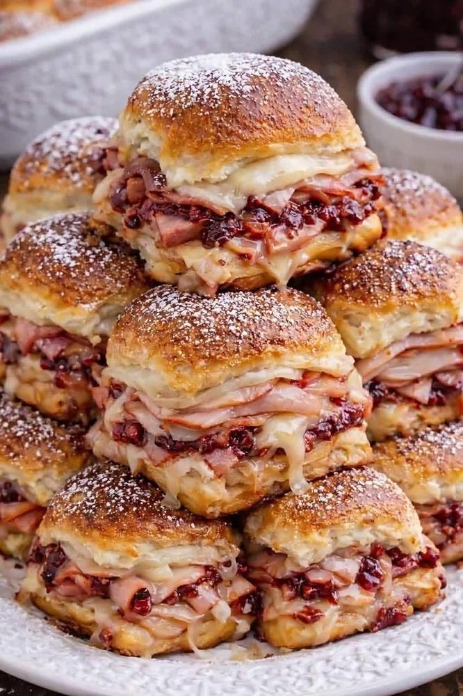 Baked Ham and Swiss Cheese Sliders with Cranberry Sauce